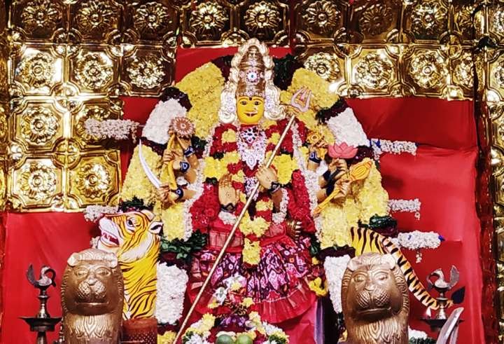 Goddess Durga idol worshipped through the Navarna Mantra in a Hindu temple.